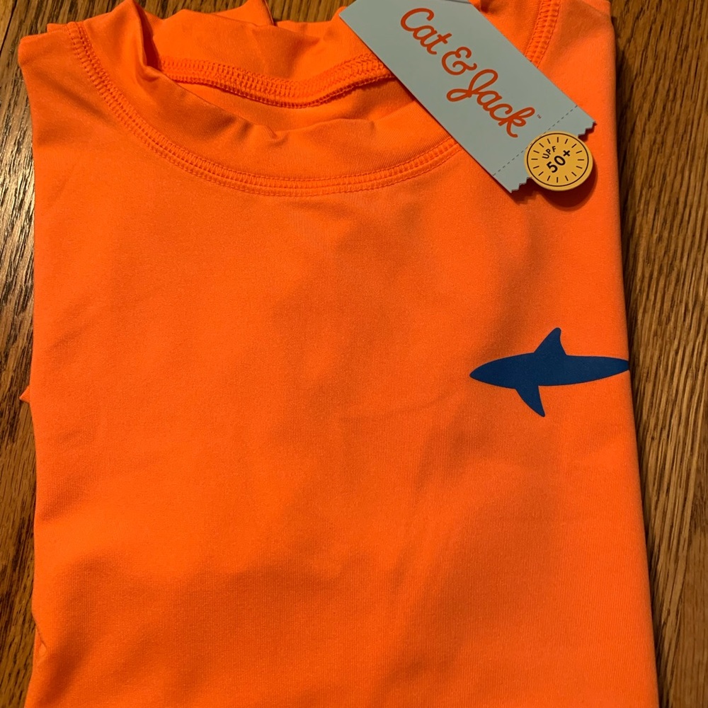Boys size M(8-10) Husky swim shirt NWT